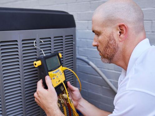 HVAC Technician Performing AC Repair in Tolleson, AZ