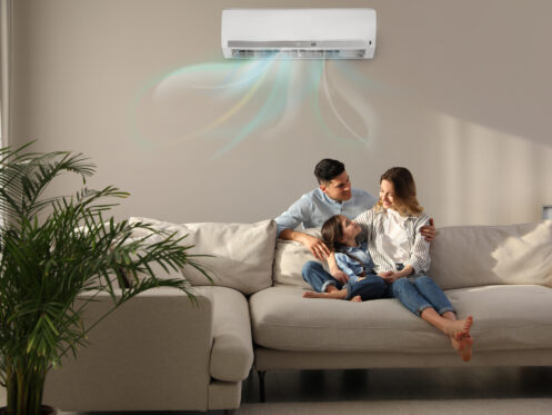 A family cooling in a room with a mini-split
